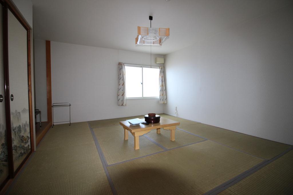Ryokan Saihokutei Rishirifuji Buitenkant foto