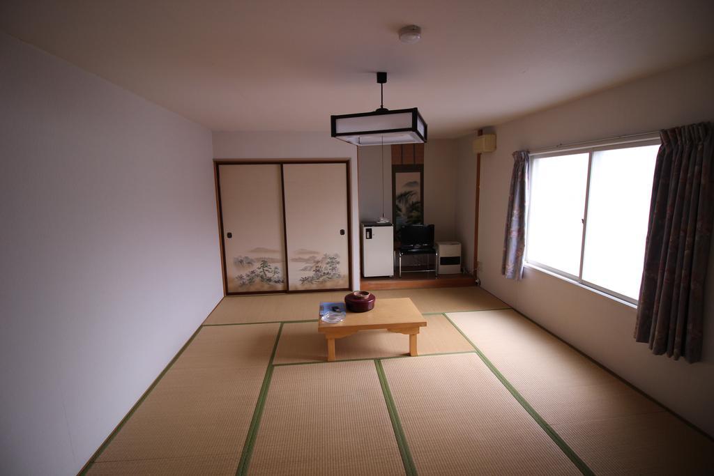 Ryokan Saihokutei Rishirifuji Buitenkant foto